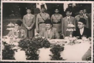 king-farouk-i-prince-mohamed-ali-tawfiq-and-prince-abulmoneim-attending-a-banquet-in-el-kobbeh-palacce-circa-1940.jpg